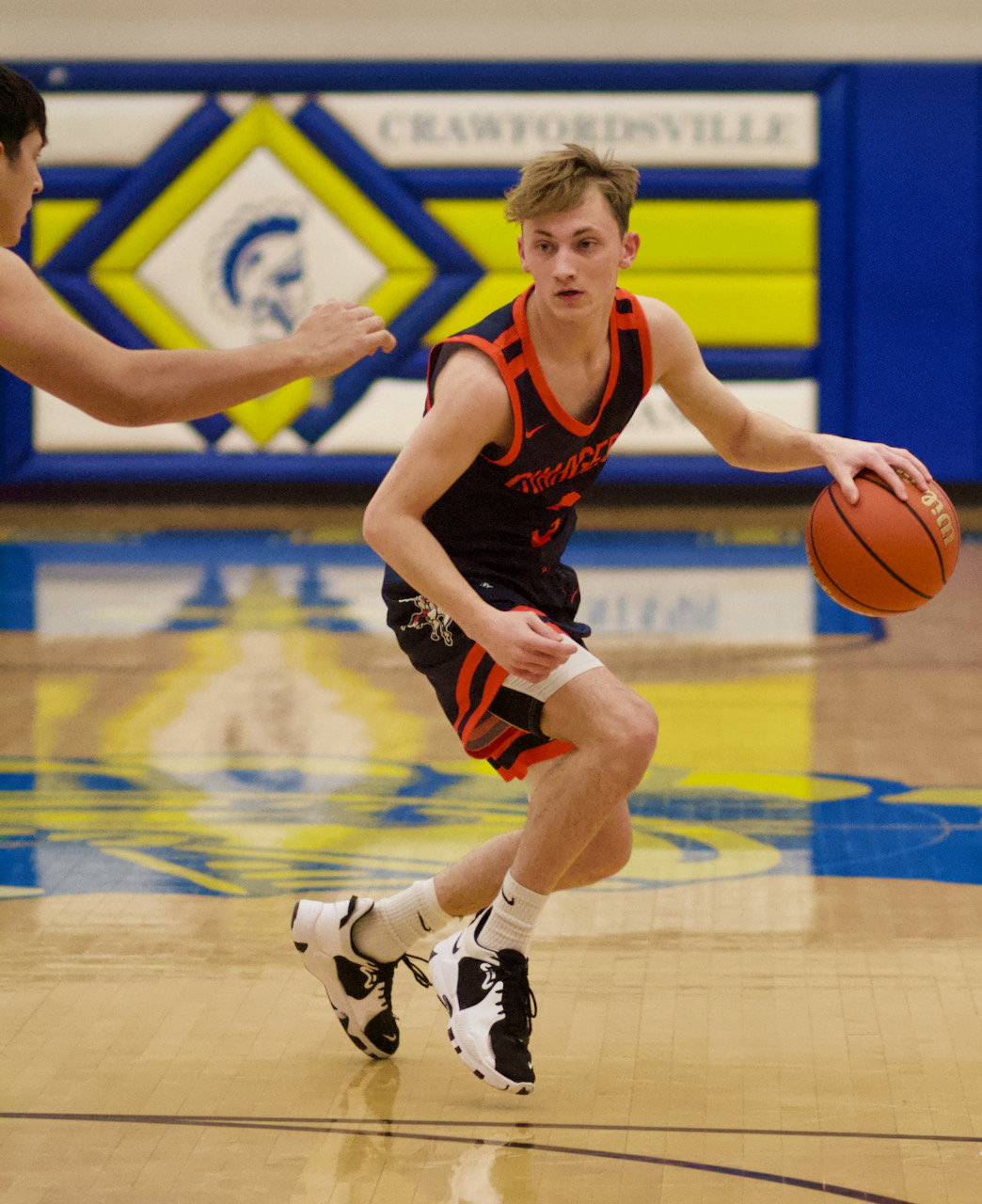 Jakob Kirsch sizes up his defender for the Chargers. He led North Montgomery with 14 points in the loss.